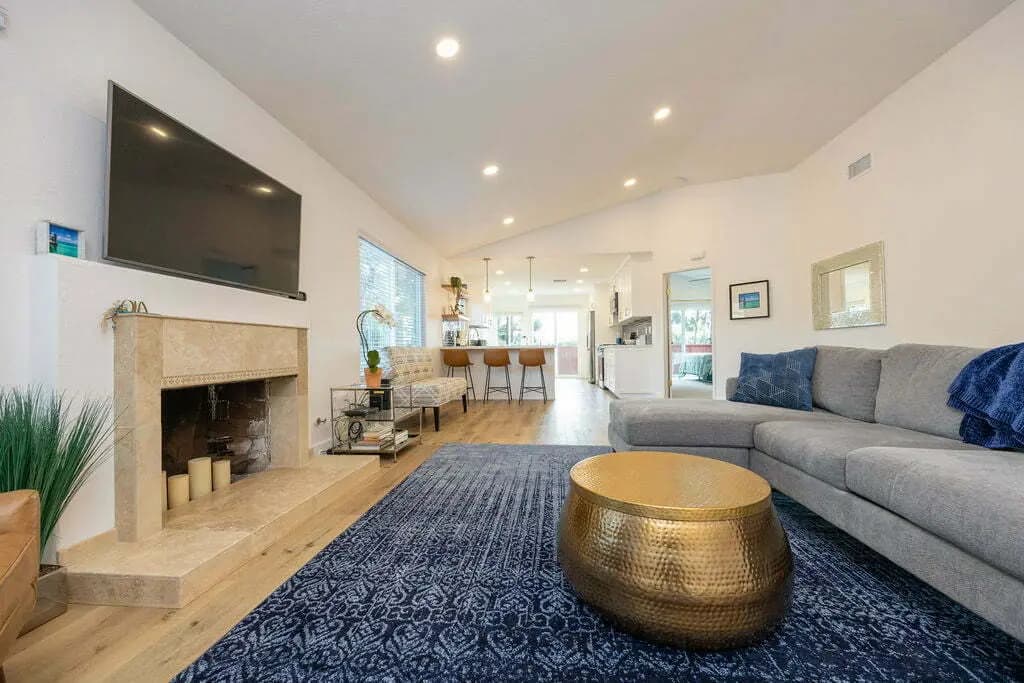 Living room remodel with fireplace and modern furniture